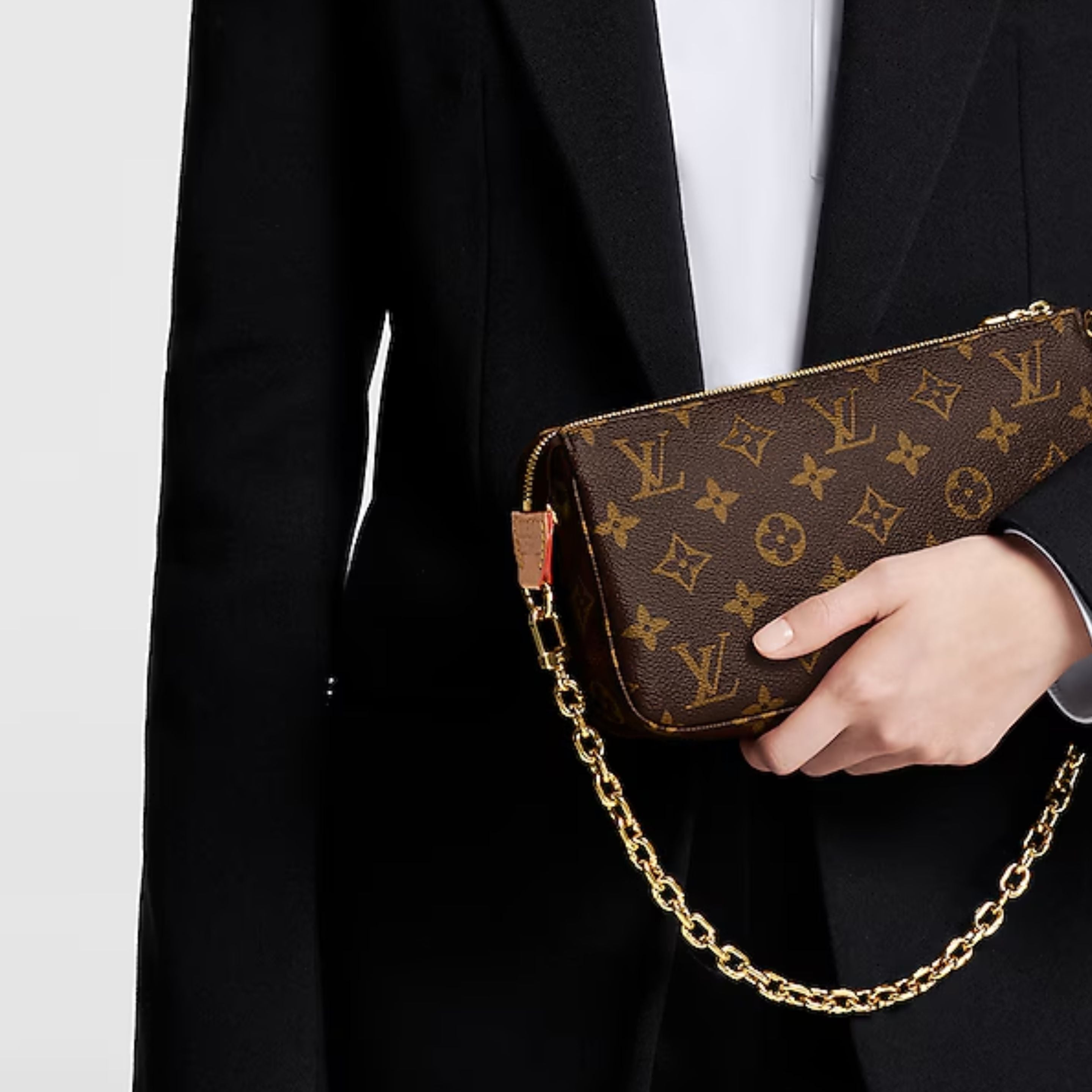 Louis Vuitton Pochette Accessoires monogram canvas with gold chain worn on shoulder