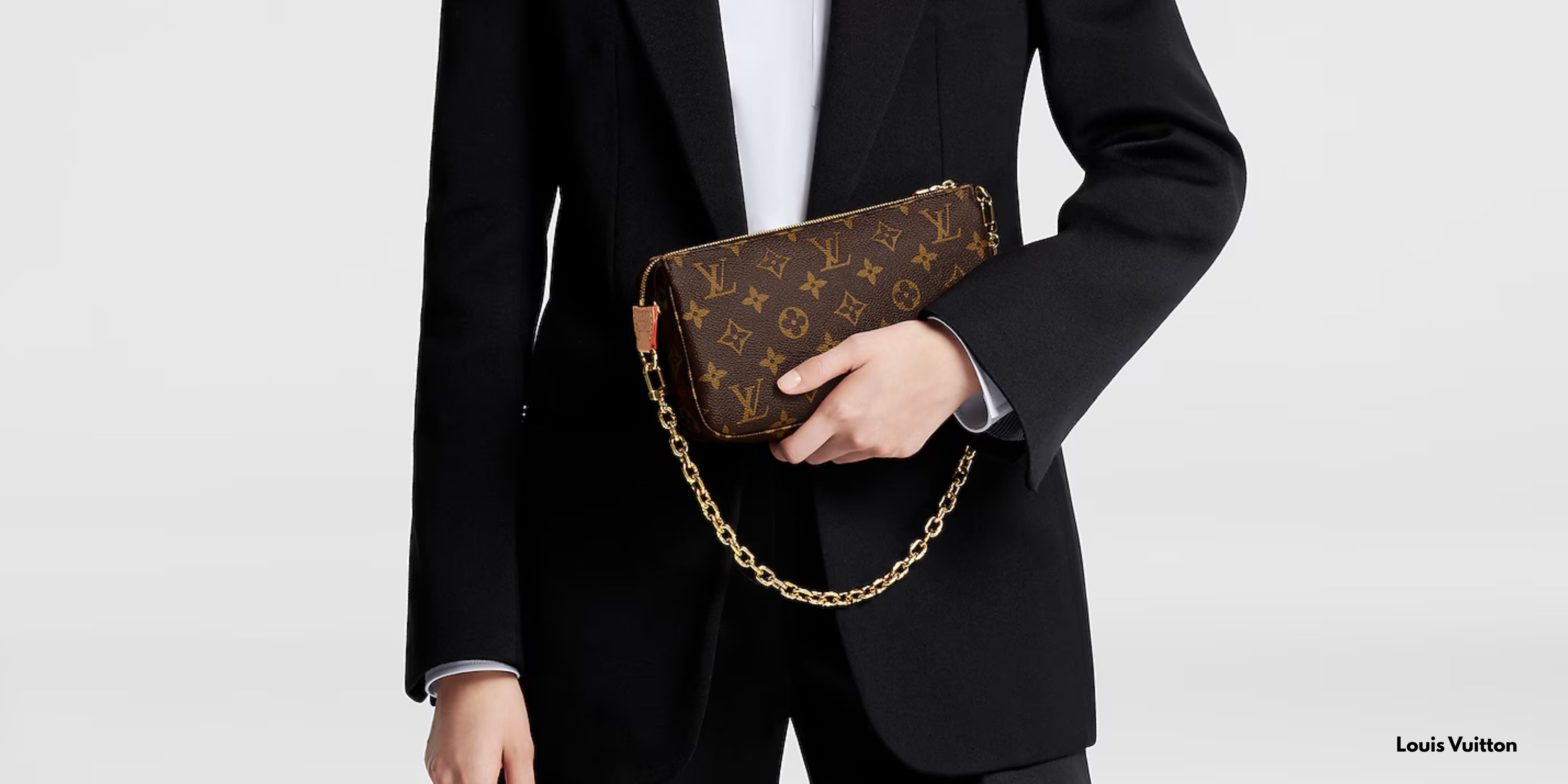 Louis Vuitton Pochette Accessoires monogram canvas with gold chain worn on shoulder