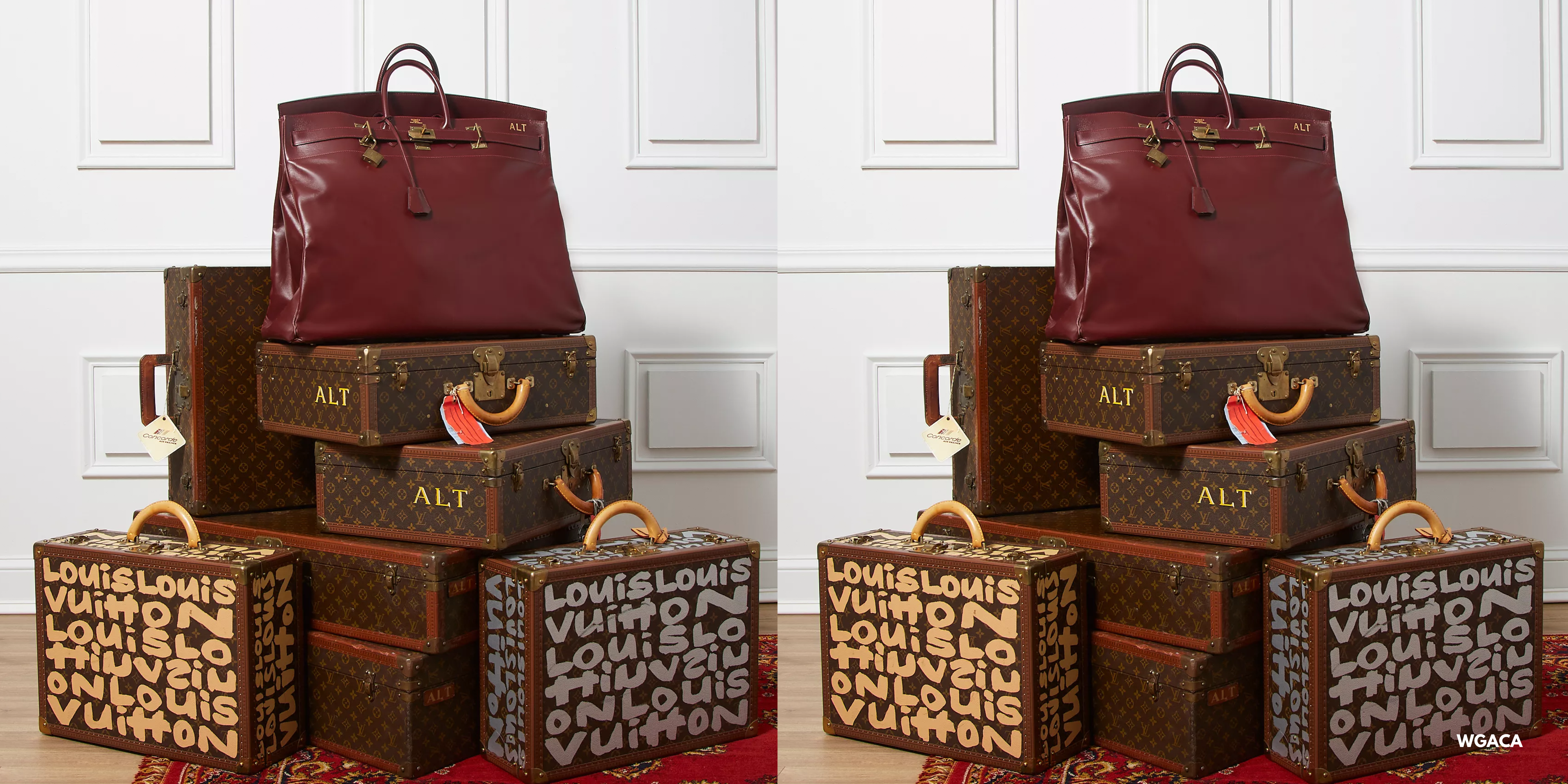 Large vintage Hermès Haut à Courroies handbag displayed on stacked Louis Vuitton trunks, illustrating the importance of proper storage and preservation for luxury bags.