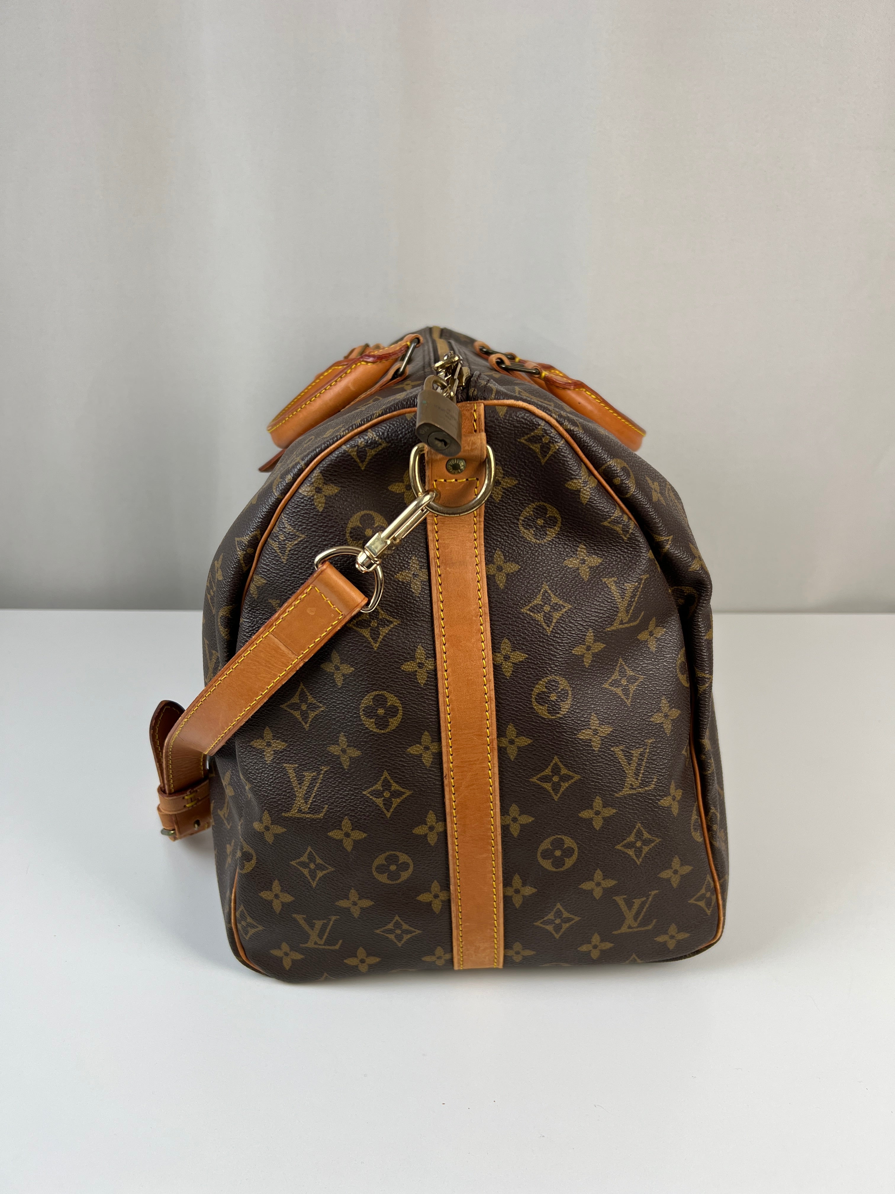 Louis Vuitton Keepall 55 Monogram canvas bag with strap