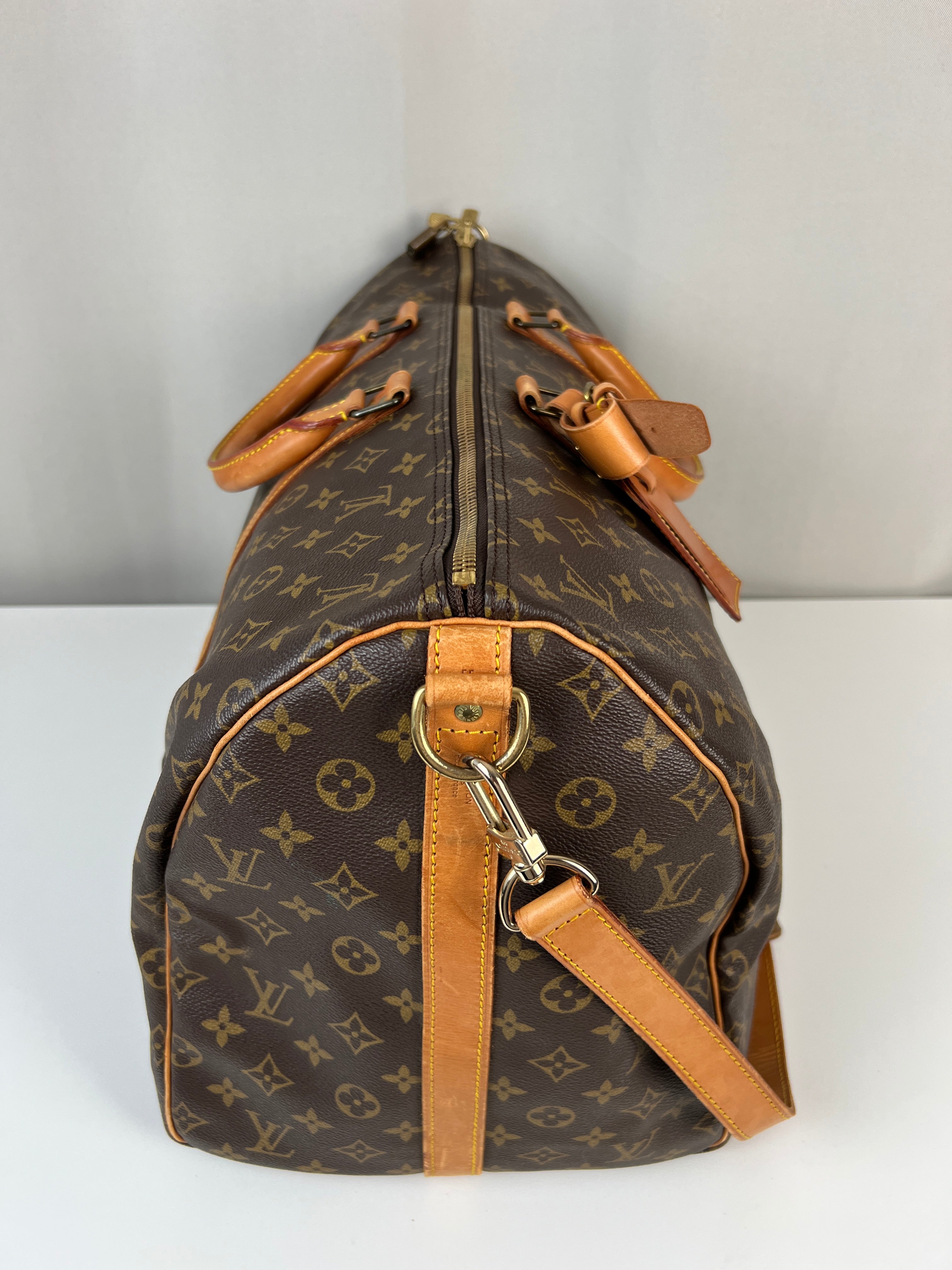 Louis Vuitton Keepall 55 Monogram canvas bag with strap