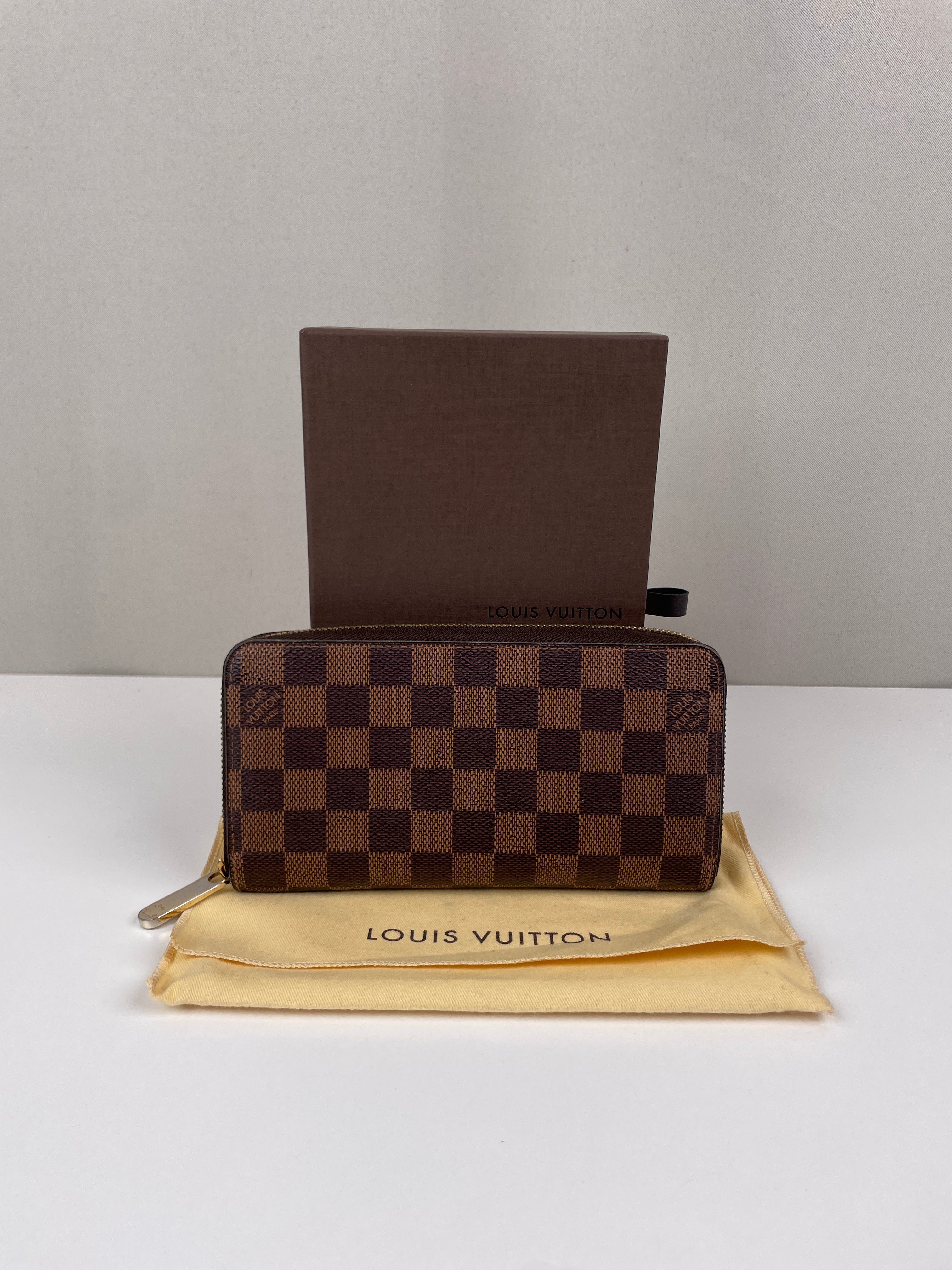 Louis Vuitton Long Zippy damier ebene wallet – bamluxurystore