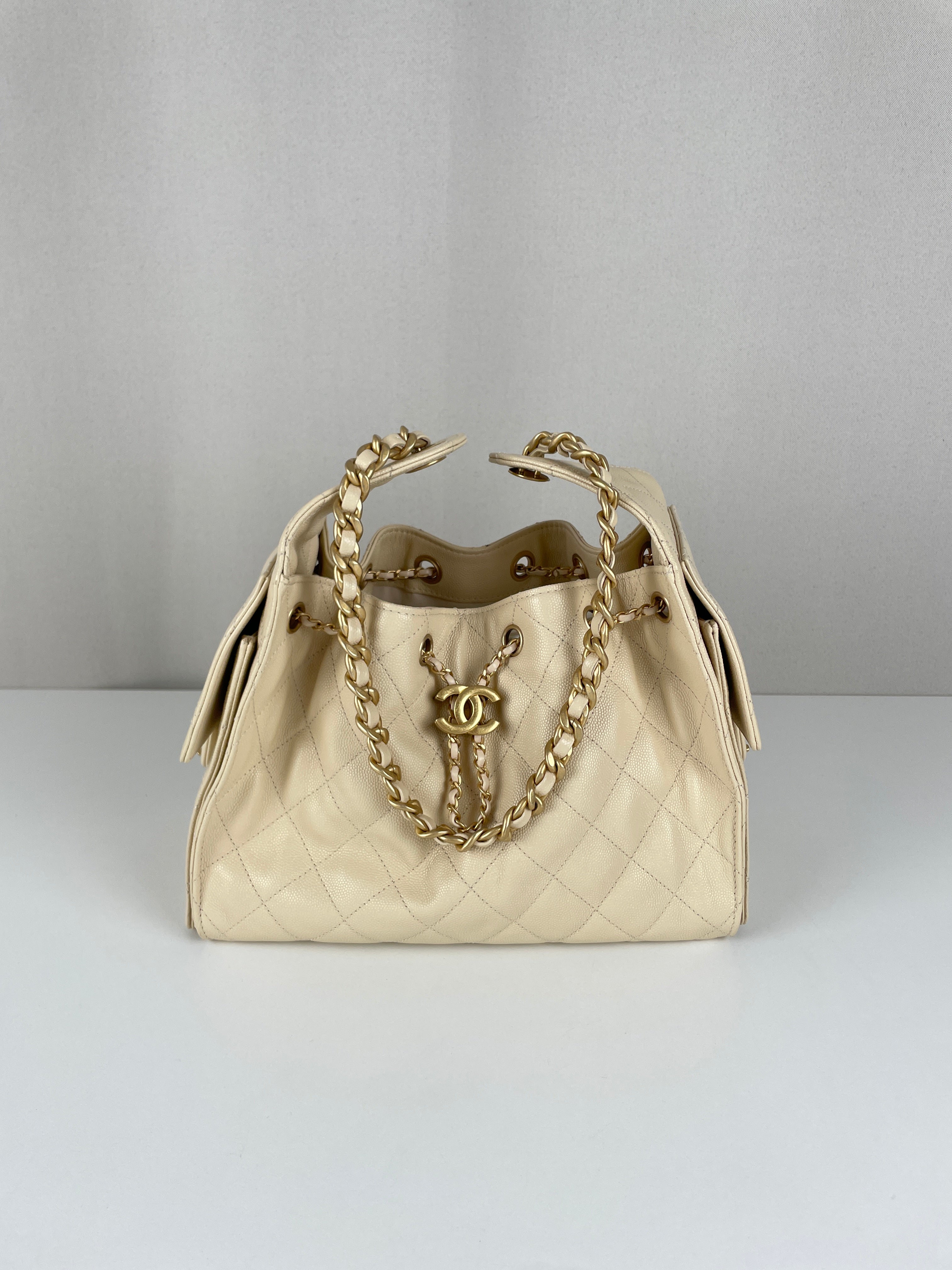 Chanel 25 small beige caviar leather – bamluxurystore