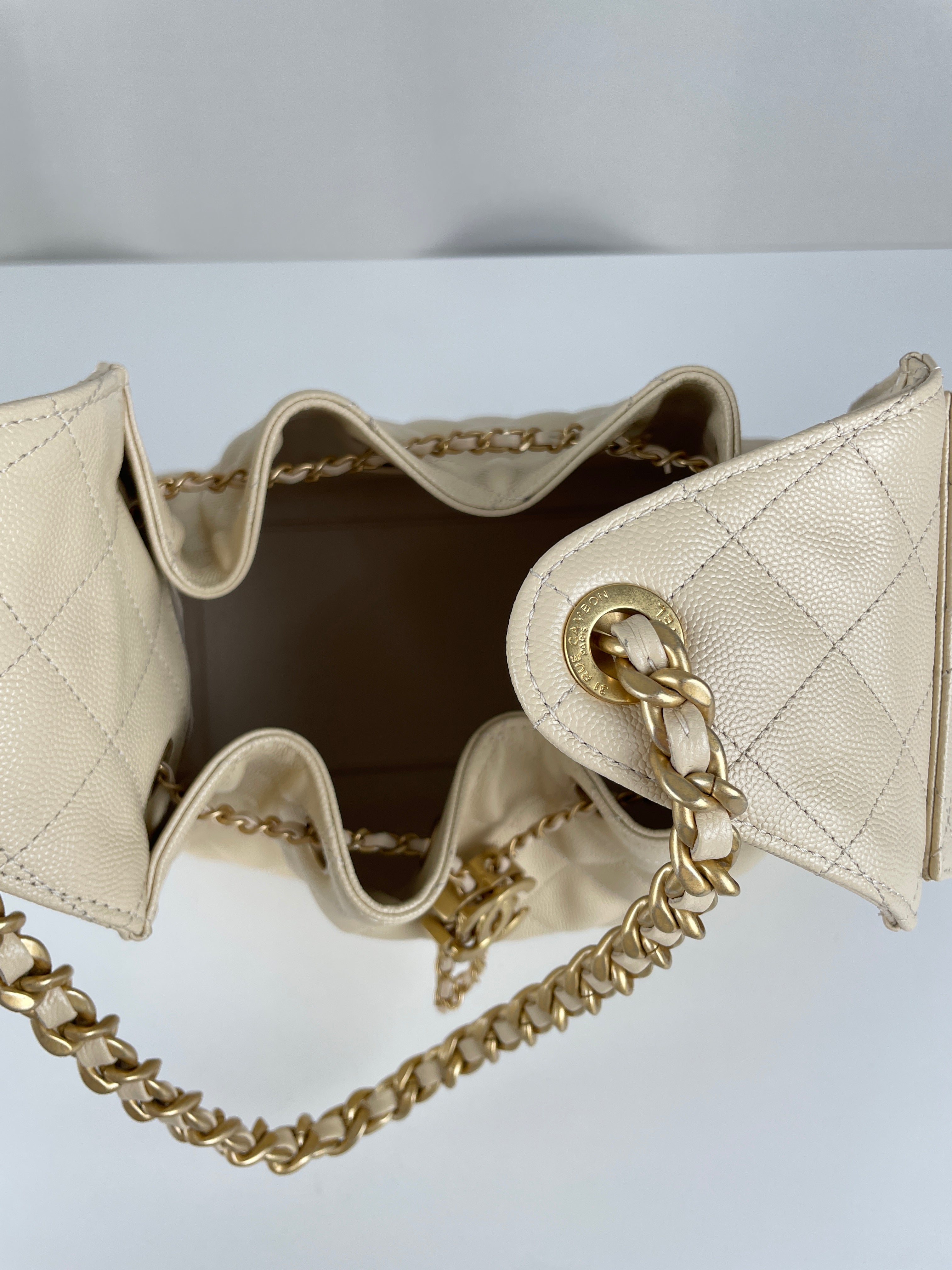 Chanel 25 small beige caviar leather – bamluxurystore